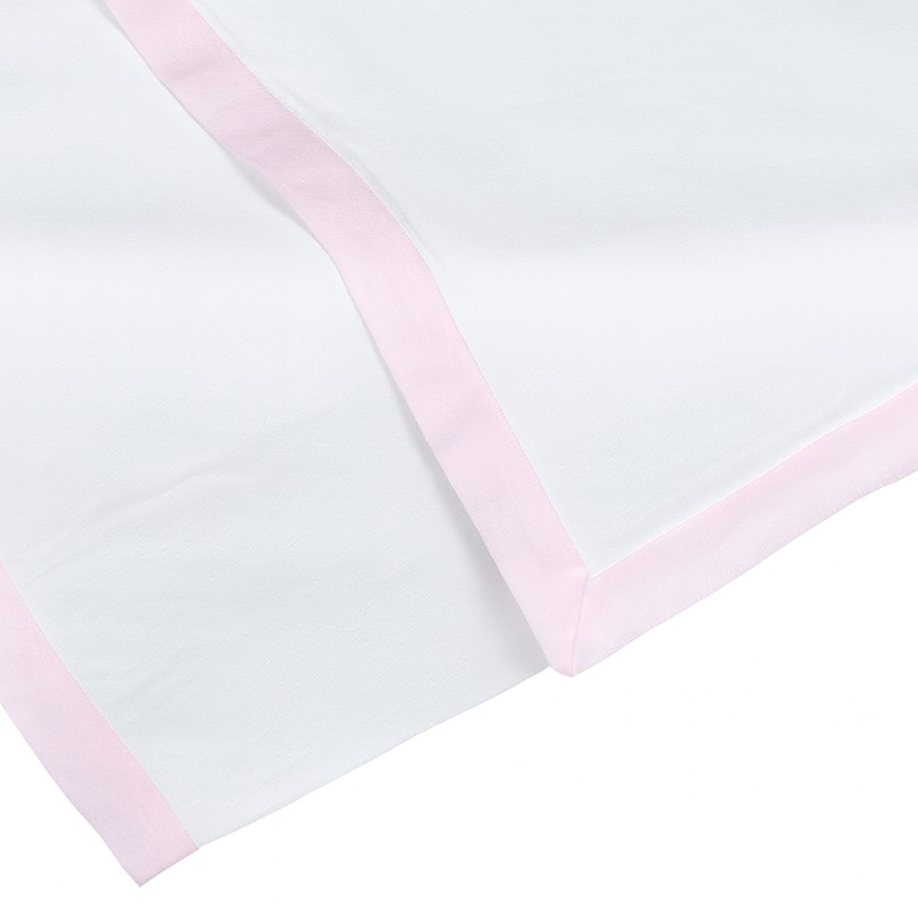 White napkin with pink trim