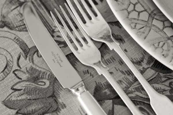 Silver fiddle-pattern knives and forks